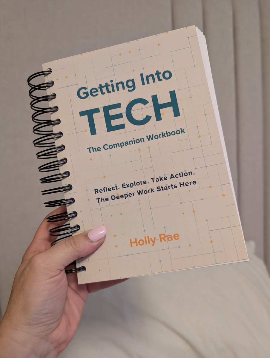 The spiral-bound Companion Workbook held in one hand