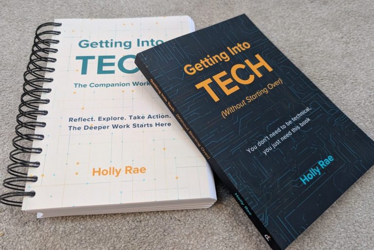 Both print books two books, one dark cover with the getting into tech title and one spiral bound with the companion workbook title